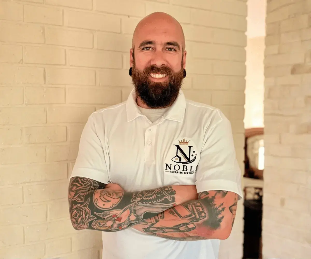 Noble Cleaning Services owner in a branded company polo, serving Bergen County, NJ